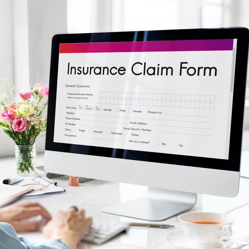 A woman registering for DFSIN insurance in Toronto West from Orlando Ali Financial, Canada